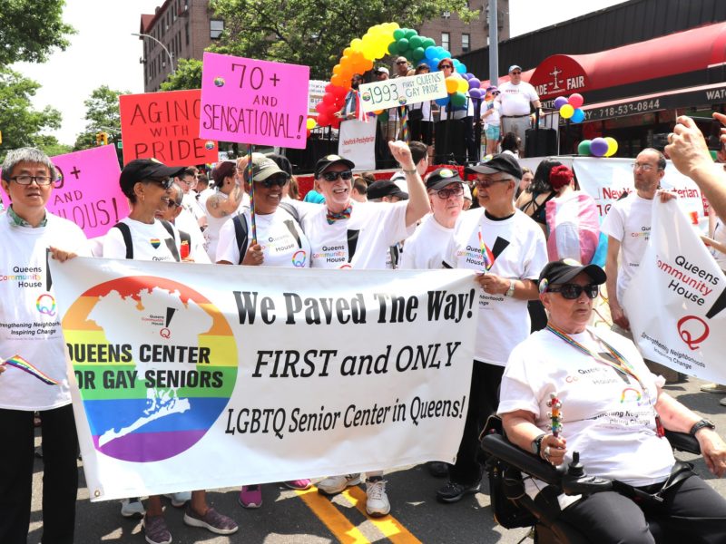 Members of a Queens LGBT Center march.