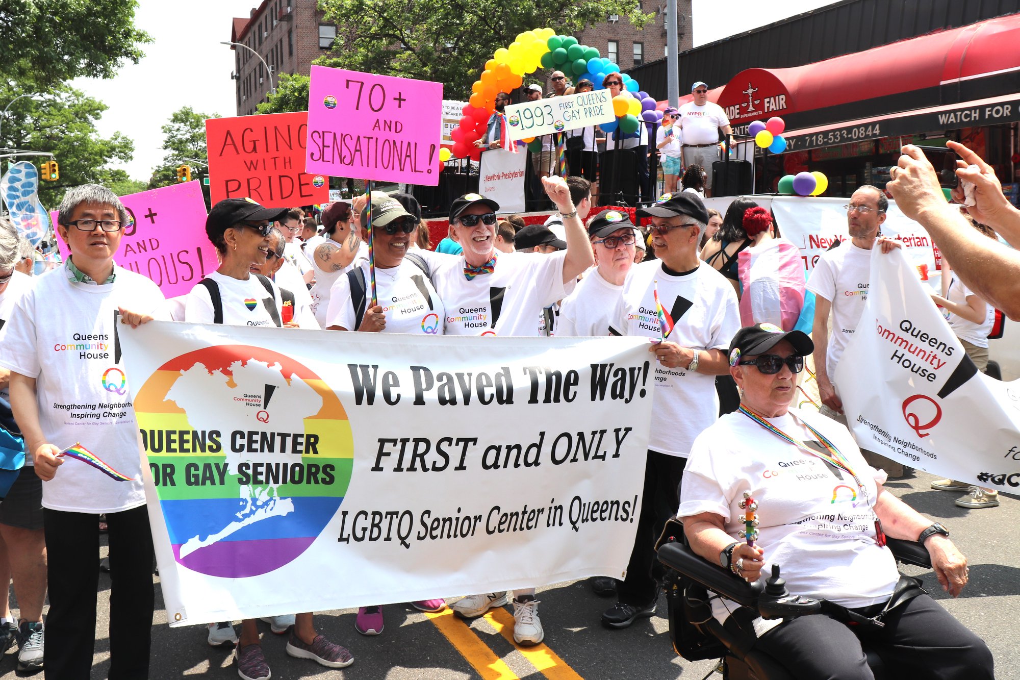 Members of a Queens LGBT Center march.
