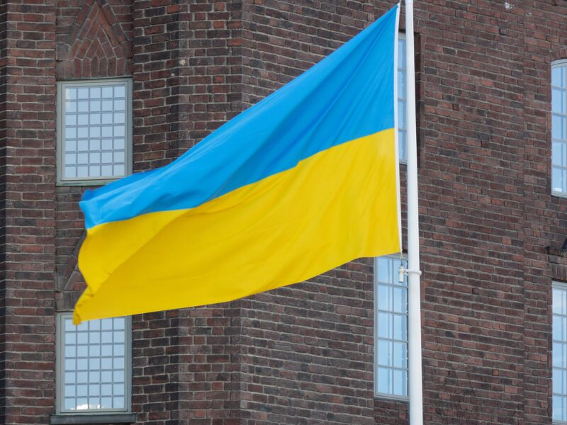 The Ukrainian flag is shown flying.