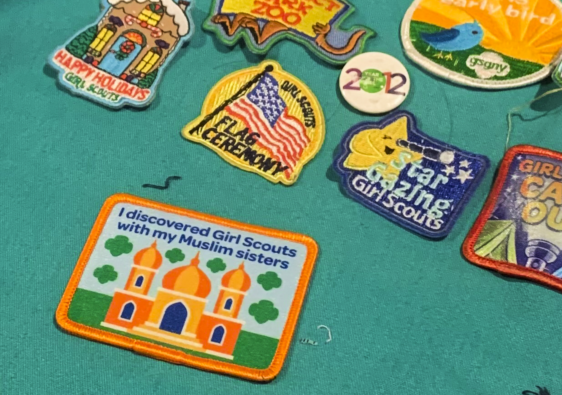Among the badges on Ismail’s Girl Scout vest, she is most proud of the one in the center that reads, “I discovered Girl Scouts with my Muslim sisters.” (Credit: Photo courtesy of The Muslim Girl Scouts of Astoria, Facebook)