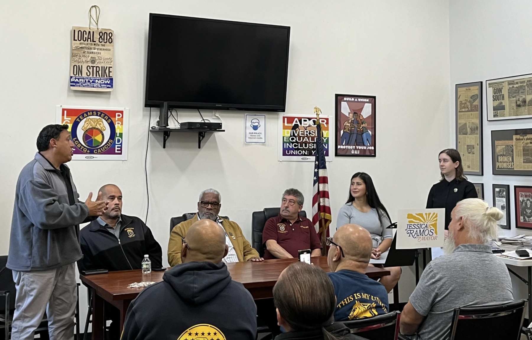 Antonio Rosario (left) speaks about Teamsters Local 804’s endorsement of State Sen. Jessica Ramos (second from the right) at a union event on Oct. 8. (Credit: Eleanor Hildebrandt)