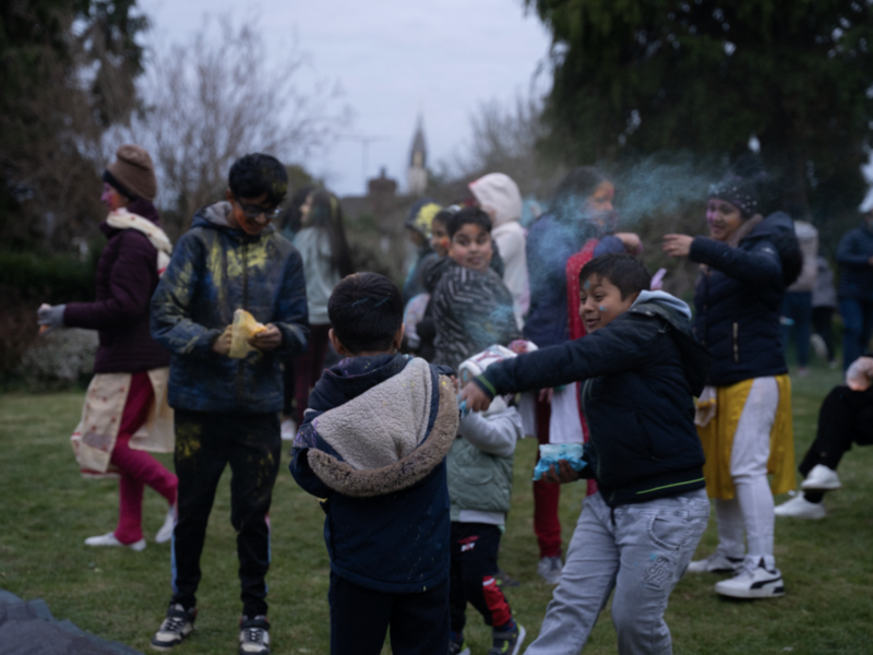 Children throw color at each other at the Holi celebration held by ISKCON Belfast on March 16. (Credit:Laine Immell)