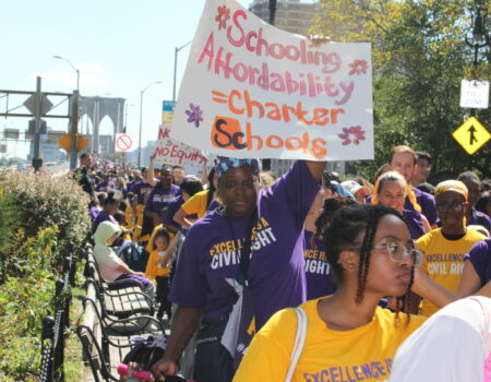 Pro-charter supporters march across the Brooklyn Bridge at a rally on Sept. 18. (Credit: Julie Lee)