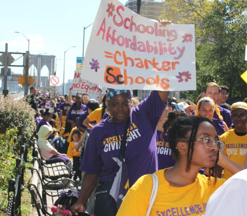 Pro-charter supporters march across the Brooklyn Bridge at a rally on Sept. 18. (Credit: Julie Lee)