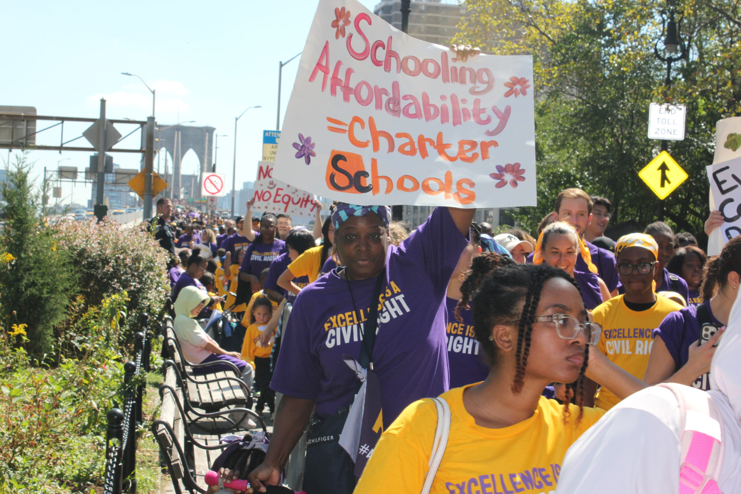 Pro-charter supporters march across the Brooklyn Bridge at a rally on Sept. 18. (Credit: Julie Lee)