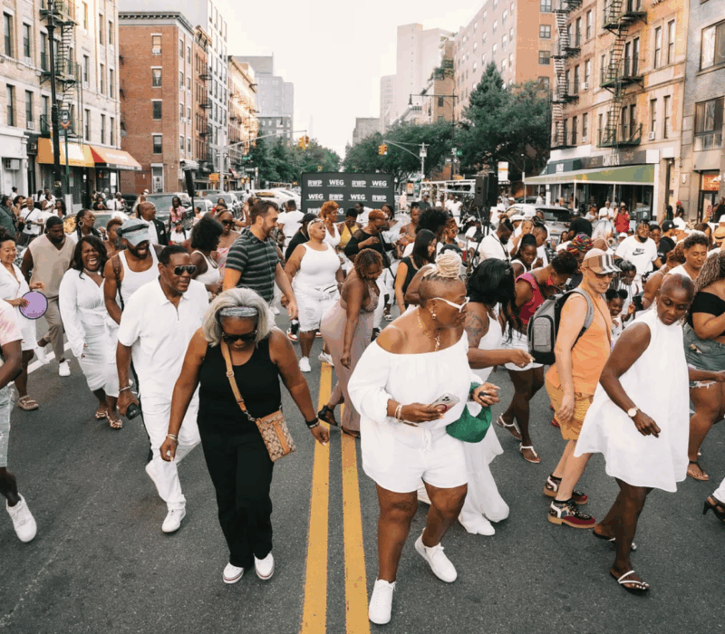 Harlem residents line dancing at Open Streets in September 2023. (Courtesy: Alex Julien)