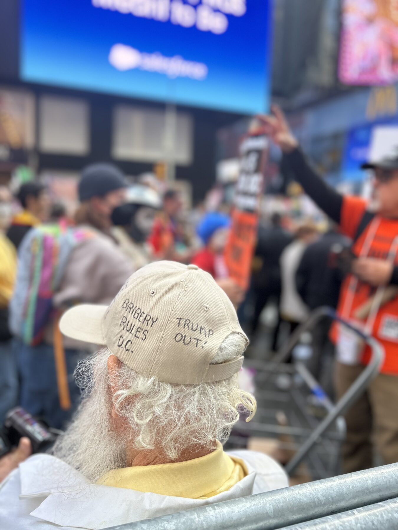 A "No Kings" participant’s hat read “Bribery Rules D.C.” and “Trump Out." (Credit: Hannah Smith)