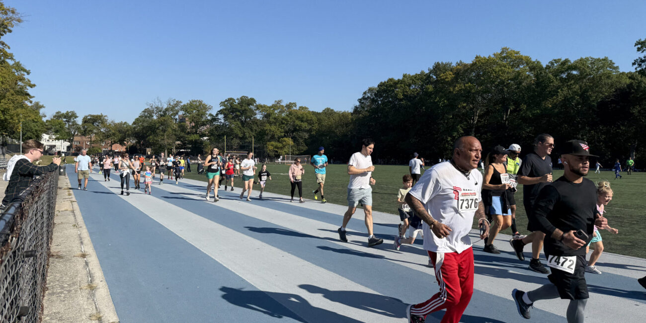 Those who opted for the 1-mile run complete two laps around the track. (Credit Kat Struhar)