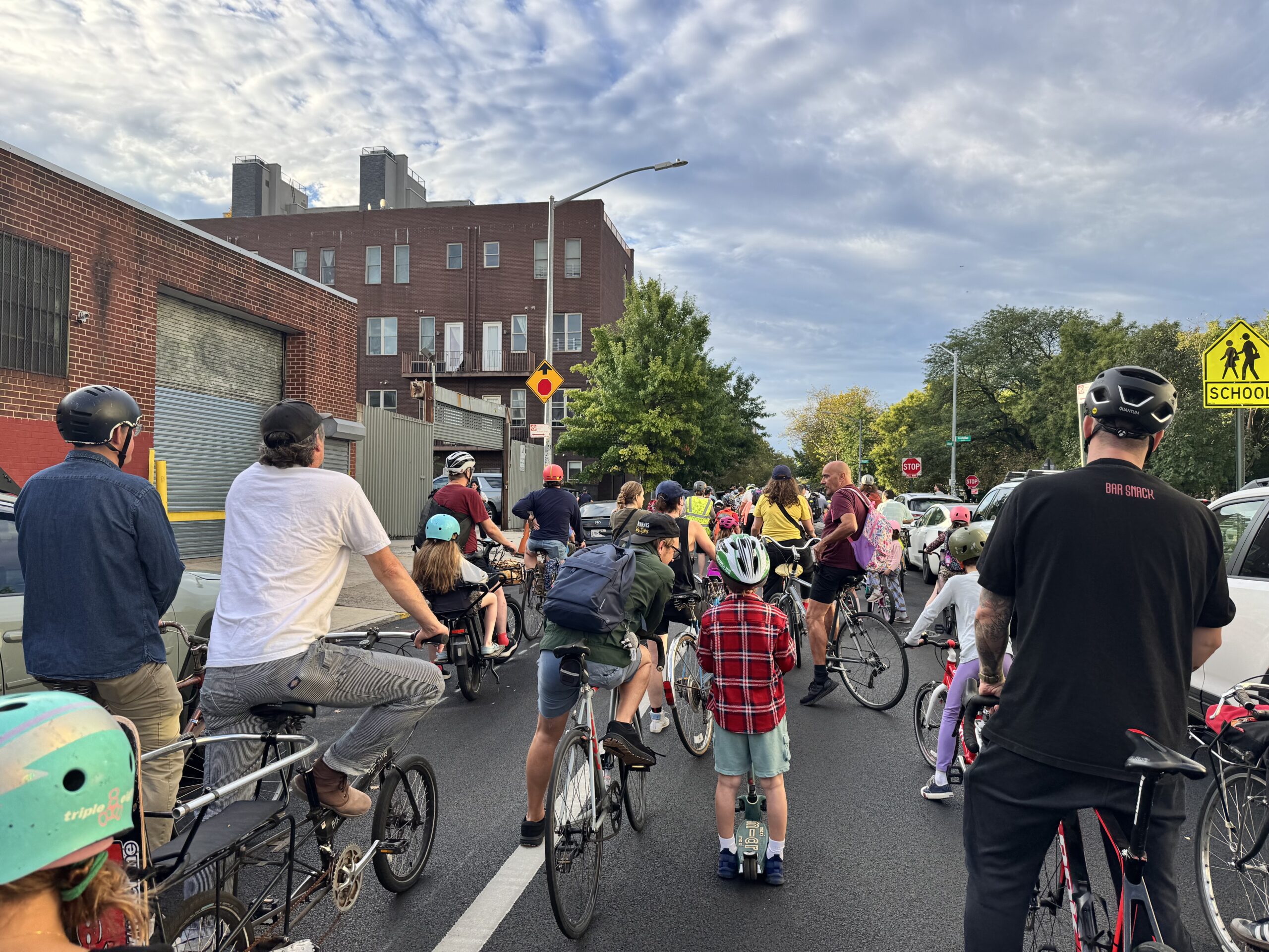 After the bike bus, P.S. 110 families gathered in the courtyard to chat before the school day began. (Credit: Manon Beliot)