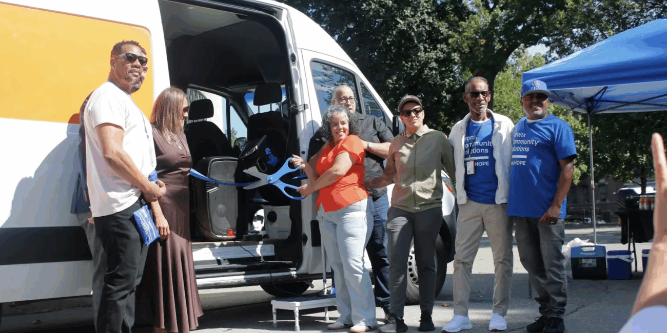 Staff and supporters of Bronx Community Solutions gathered in Poe Park for the launch of the HOPE-Mobile Outreach van. (Credit: Anna Lee)