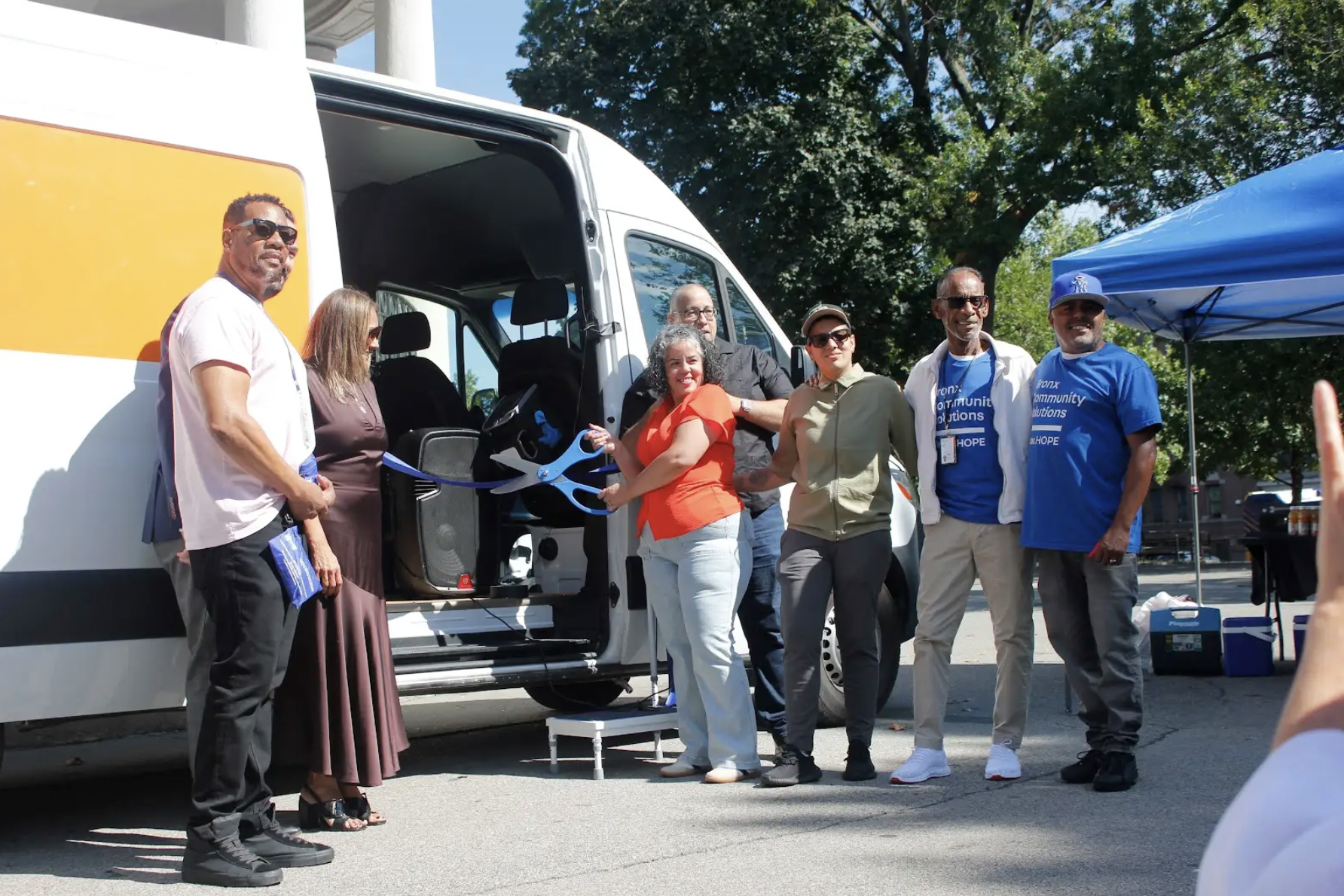 Staff and supporters of Bronx Community Solutions gathered in Poe Park for the launch of the HOPE-Mobile Outreach van. (Credit: Anna Lee)