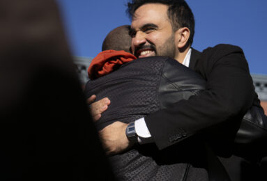 Mayoral candidate Zohran Mamdani hugs a supporter outside a polling site at PS 20 Anna Silver School in the Lower East Side of New York on Election Day, Tuesday, Nov. 4, 2025. (Credit: Rachel Zhong)