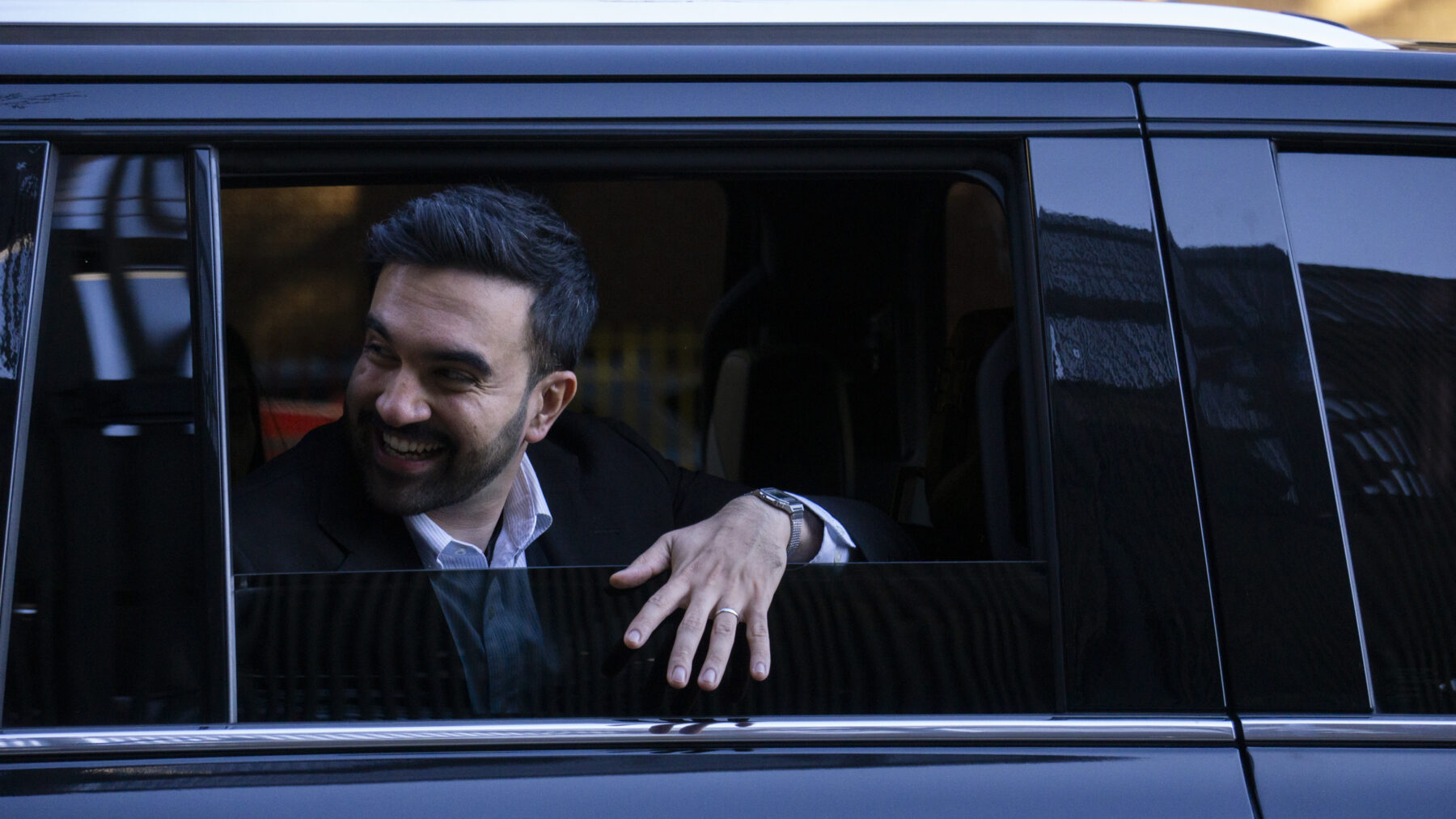 Mayoral candidate Zohran Mamdani waves goodbye to voters outside PS 20 Anna Silver School in the Lower East Side of New York on Election Day, Tuesday, Nov. 4, 2025. (Credit: Rachel Zhong)