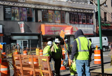 Construction workers operate equipment at a work site in Manhattan. (Credit: Anna Lee)