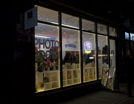 Customers stand inside of Pikchi Photobooth on the Lower East Side on Dec. 7, 2025. (Credit: Jasmine Venet)
