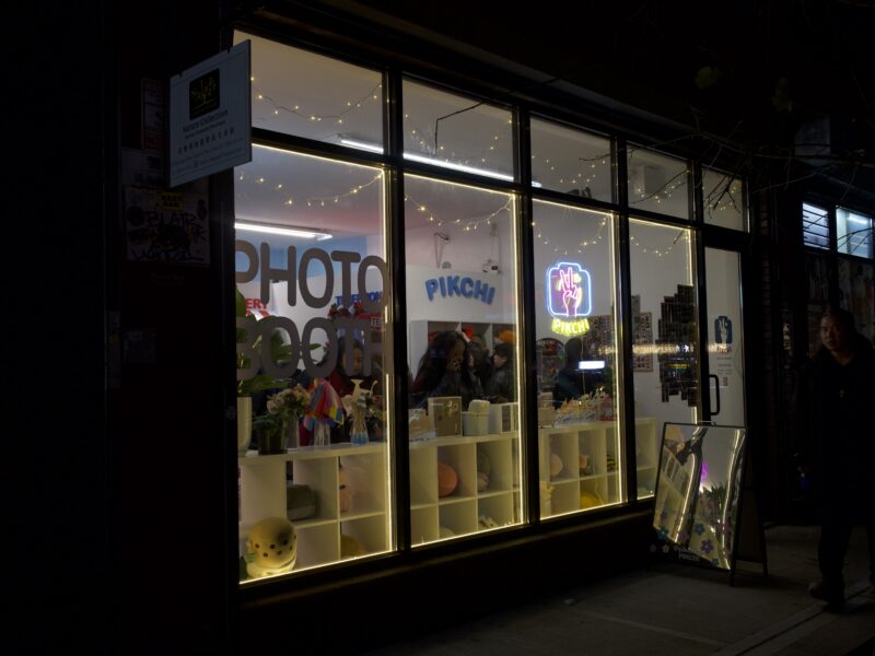 Customers stand inside of Pikchi Photobooth on the Lower East Side on Dec. 7, 2025. (Credit: Jasmine Venet)