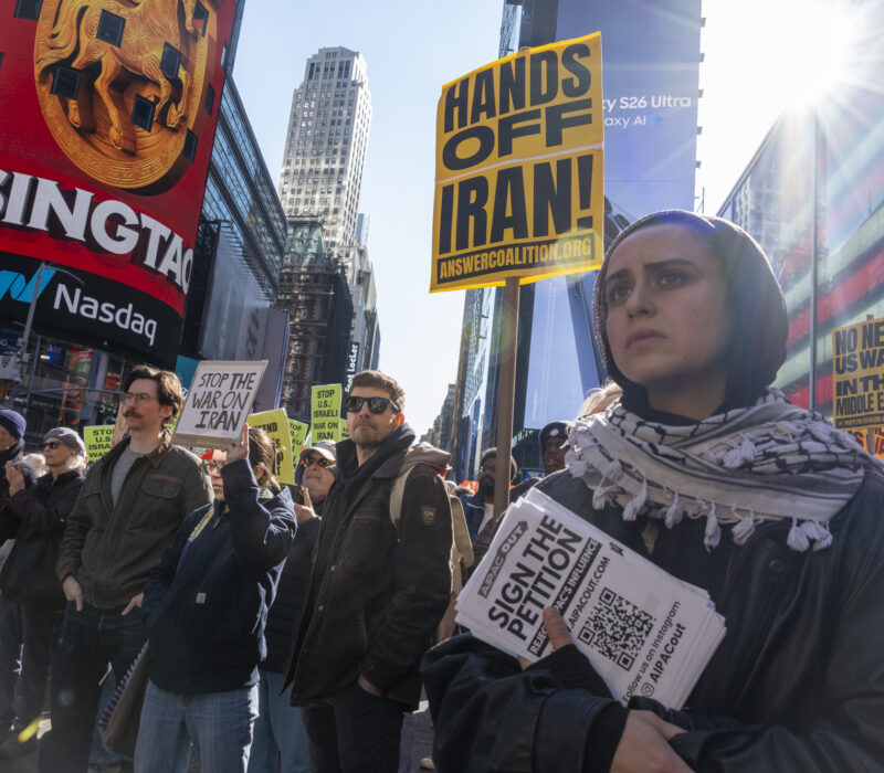 A female protester displayed a concerned expression. (Credit: Victor Heller)