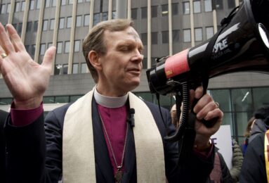 Episcopal Bishop of New York Matthew F. Heyd during a call to prayer at 26 Federal Plaza. (Credit: Sidney Kuri Poor)