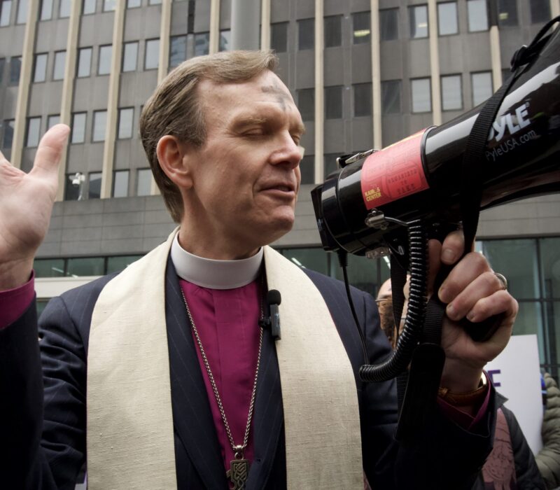 Episcopal Bishop of New York Matthew F. Heyd during a call to prayer at 26 Federal Plaza. (Credit: Sidney Kuri Poor)
