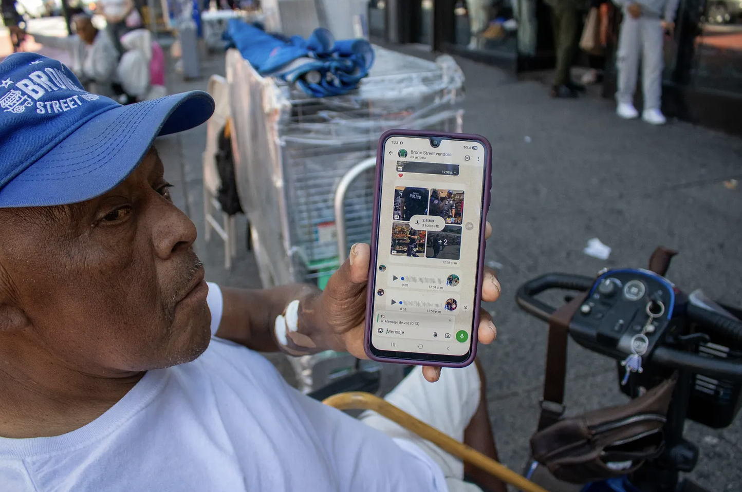 Armando Garcia shows the Bronx Street Vendors chat that alerts vendors, on Sept. 3, 2026. (Credit: Nicole Williams Quezada)