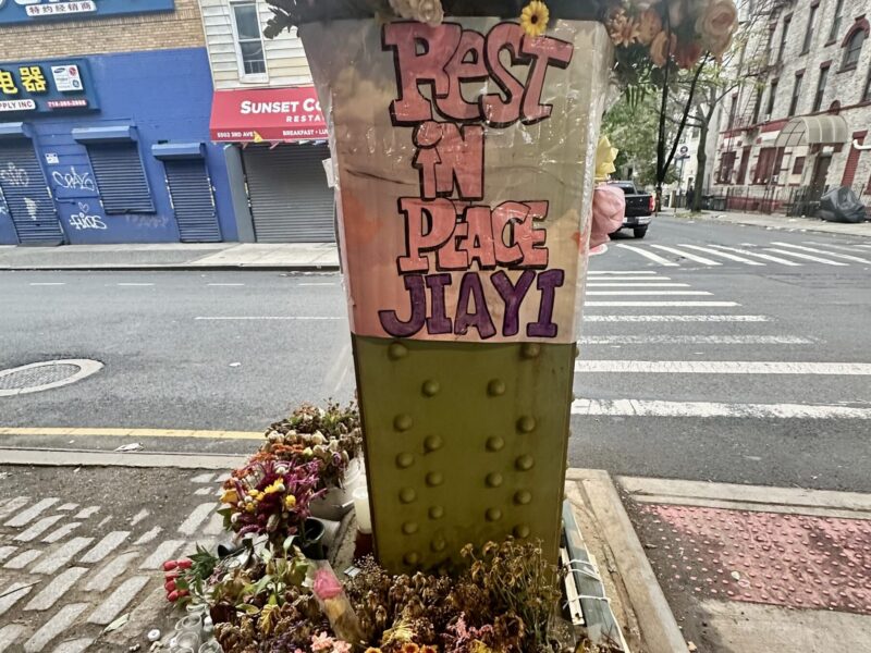 Wilting flowers gather for hit and run victim, 28 year old Jiayi Zheng, a nurse at NYU Langone Brooklyn. (Credit: Thisanka Siripala)