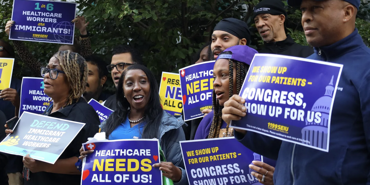 1199SEIU members rally outside of Lenox Hill Hospital in support of immigrant healthcare workers on Sept. 24. (Credit: Mika Travis)