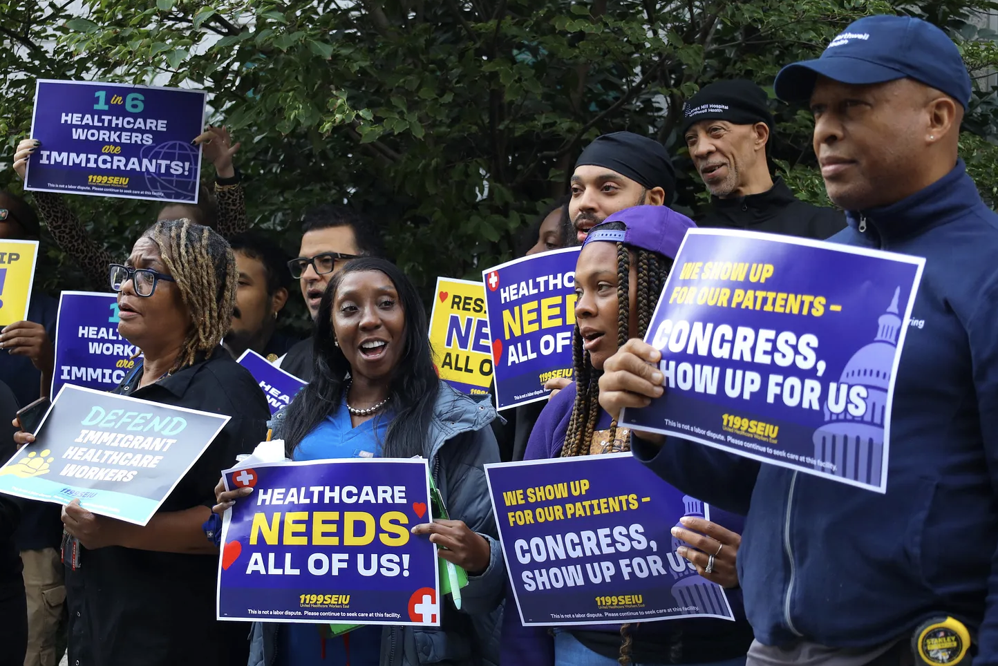 1199SEIU members rally outside of Lenox Hill Hospital in support of immigrant healthcare workers on Sept. 24. (Credit: Mika Travis)