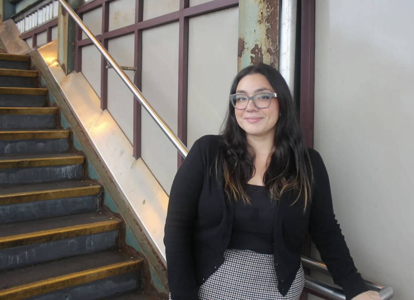 Paraprofessional Alyson Monzon works a second job to cover her expenses (Credit: Sasha Rivers)