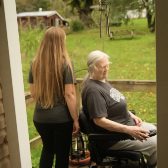 Cynthia Crandall, right, and her caregiver, Chris Pagano. (Credit: Matthew Herskowitz)